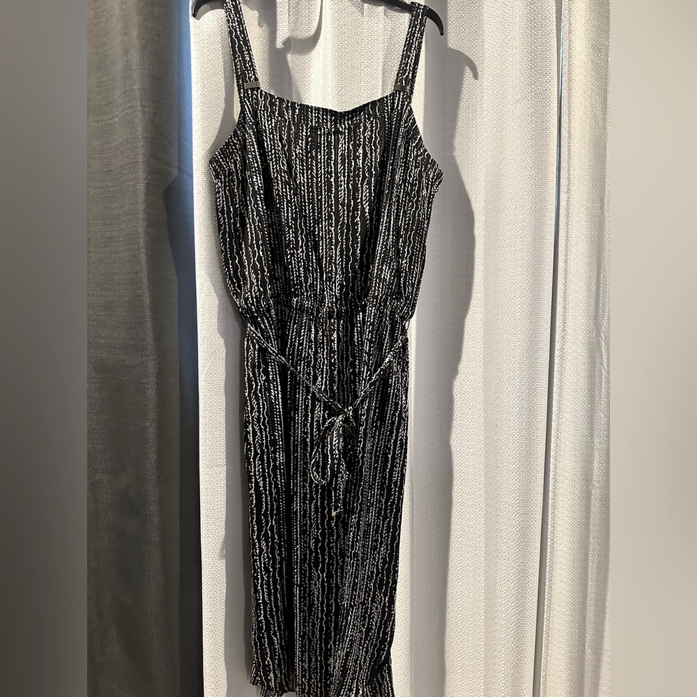 Worn once. Satin black and white sleeveless dress.